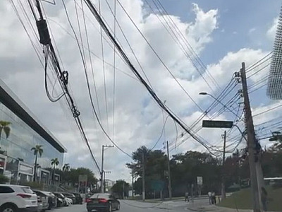 Fio pendurado interrompe tráfego na Alameda Araguaia